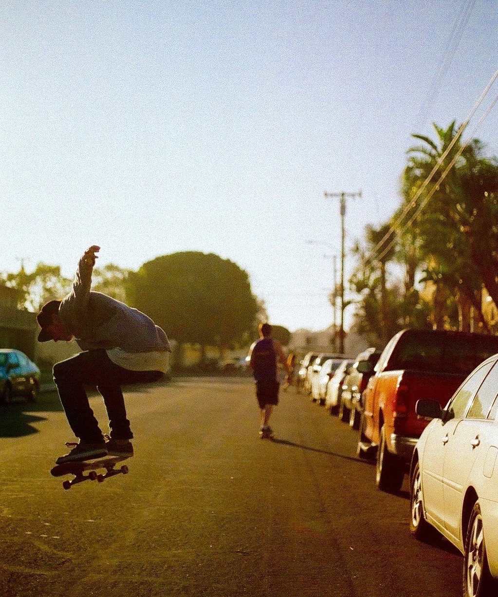 Skater doing an ollie on a Santa Barbara street